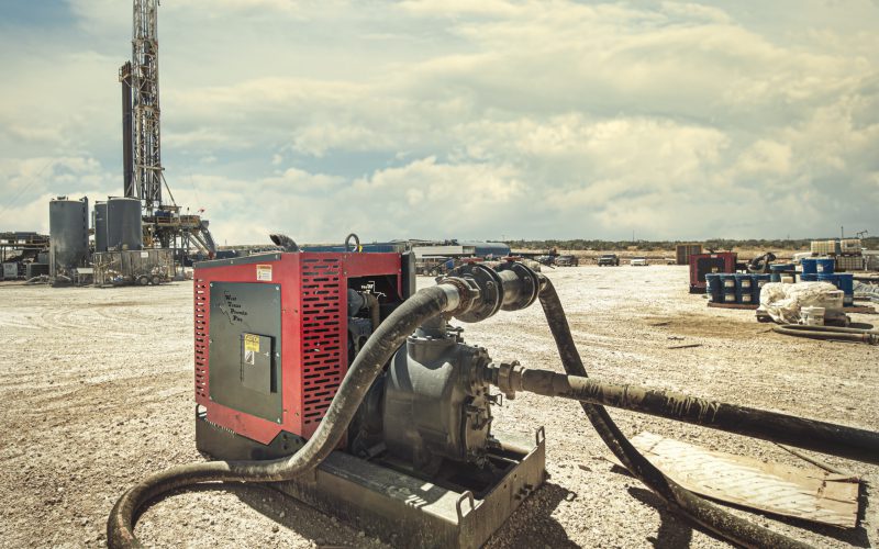 Suction hose on a Patriot pump unit at a drilling rig site