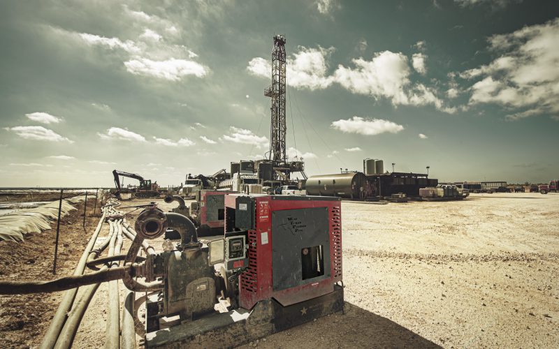 Patriot pump unit operating at an oil and gas drilling rig site