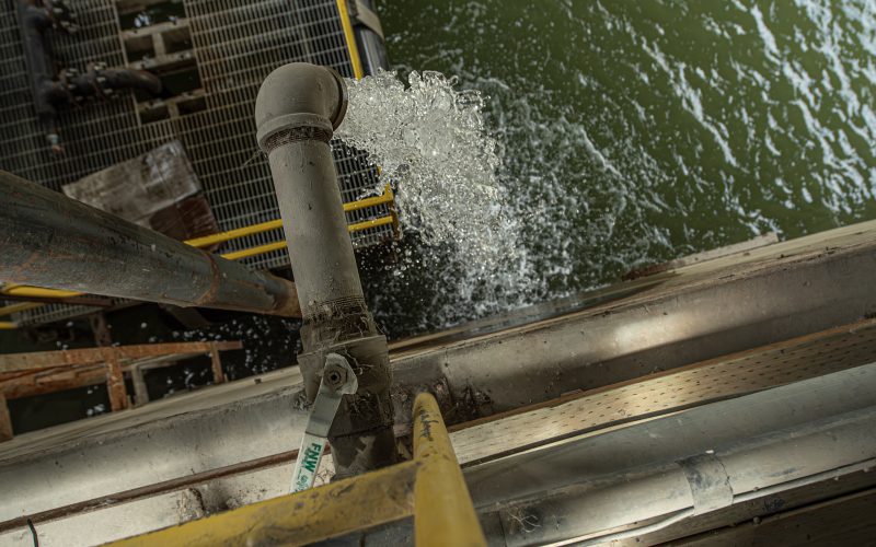 Water discharging from an industrial process pipe